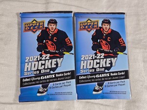 Lot of 2 Unopened 2021-22 Upper Deck Hockey Series One with Young Guns Rookie Cards.