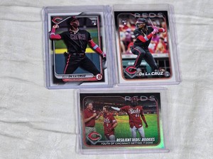 Lot of 3 Elly De La Cruz Baseball Cards featuring Rookie Cards and a Silver Foil SP