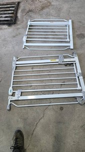 Two White Metal Safety Gates