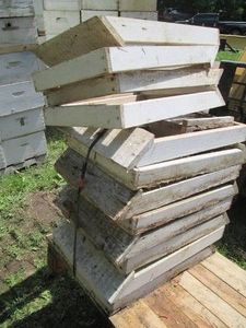 Half pallet base with stacks of woo...