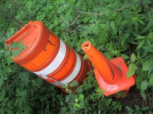 4 Orange Safety cones plus 1 Orange...