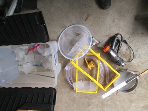 Clamshell closing tote containing a...