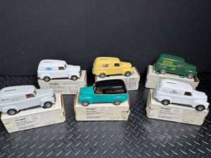 Six ERTL Chevrolet Vans Mixed Lot