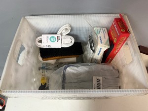 New in box Surge protector, utility knife, security glasses, face masks, disposable nitro gloves, extension cords, 12 pair of 5pe84 Gloves