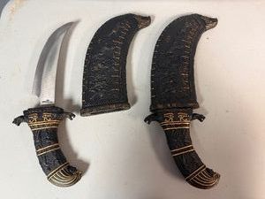 Egyptian Motif Knives with Curved Stainless Steel Blade 14 Overall.  Ornate Handle and Sheath.