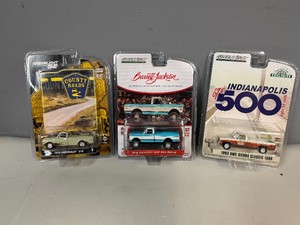 Three Greenlight Collectible Pickup Trucks Barrett-Jackson 1972 Chevy, 67th Indy 500 1983 GMC Sierra and Country Roads 1970 Chevy