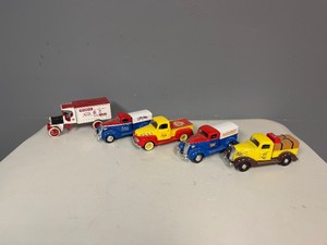 Five Collectable Trucks Kenworth Dairy Queen Bank, 37 Chevy Eastwood, 48 Ford Shell, 37 Chevy Excelsior Auto Cycle, 37 Chevy Golden Rule Lumber Center