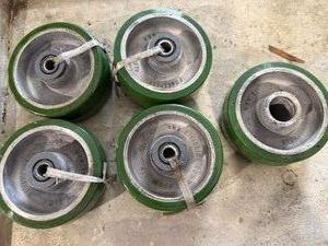 Five Albion Polyurethane Tread on an Aluminum Core Wheel (1 missing center piece)