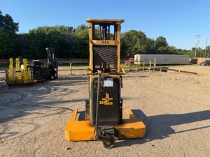 Big Joe Straddle Truck Model # 2024-T10EE 120 Lift Height, 2000 LB Max Capacity.  Manually Powered Directional, Battery Powered Lift