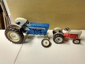 (2) Metal Ford Tractors