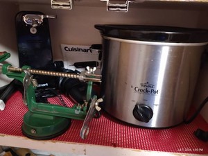 Contents of (1) Shelf - Small Crock Pot, Apple Peeler, Can Opener, Elec. Bread Knife