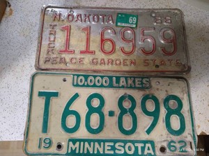 (2) Vintage License Plates