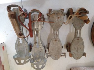 (2) Pairs Vintage Strap-On Metal Roller Skates