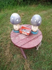 Small Outdoor Table, (2) Metal Mushroom Sculptures, & Rocks