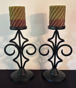 O - Pair of Pillar Candle Holders With Candles