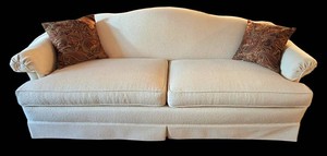 LR - Beige Upholstered Sofa With Throw Pillows