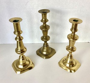 Trio of Antique Brass Candlesticks