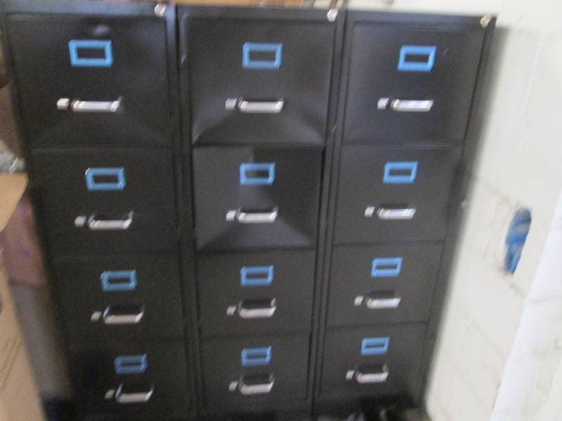 3 Metal 4 drawer file cabinets, one...