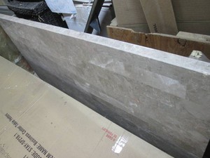 Solid faux granite over cast base t...