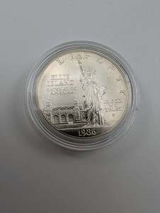 90% Silver 1986 Ellis Island Commemorative Dollar Coin in Capsule