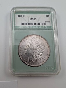 1883-O Morgan Silver Dollar NTC MS63
