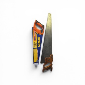 vintage hand saw, potentially manufactured by Henry Disston & Sons or featuring a Warranted Superior medallion and a New Saw