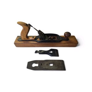 Vintage Stanley Bailey transitional wood plane, featuring a cast iron mechanism mounted on a wooden body