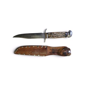 Vintage knife is marked as a Solingen Germany blade, manufactured by American Knife Co. or Sabre.