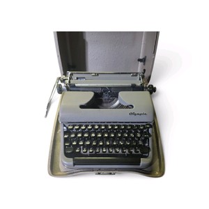 Vintage Olympia SM3 manual portable typewriter with Case