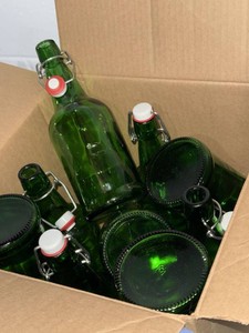 Lot Including Approx. 7 Green Glass Swing Top Bottles Various Sizes