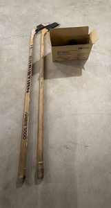 2 Christian Hockey Sticks & Approx. 20 Practice Pucks