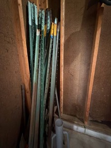 Lot Including Approximately 25 Steel T-Posts & Manual Post Driver