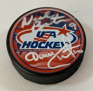 Neal Broten and Dave Christian Autographed USA Hockey Puck