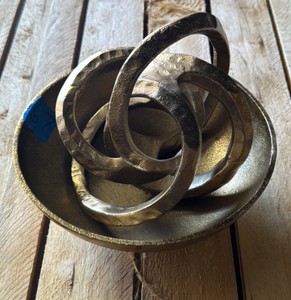 Metal decorative bowl and sculpture