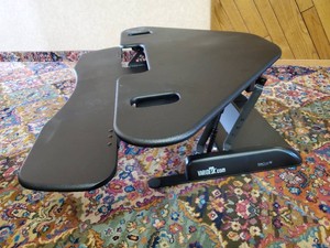 Lightly used Cube Corner 48 Varidesk Raising Desk for Sitting or standing
