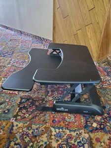 Lightly used cube corner pro plus 36 Varidesk Raising Desk for sitting and standing&nbsp