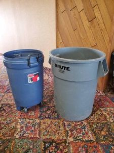 industrial Brute Garbage can and Rubbermaid Rolling Garbage Can