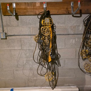 Lot of Extension Cords and Yellow Cage Work Lights