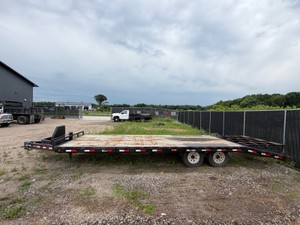 2015 PJ 26 Deck-over Equipment Trailer with fold-up ramps.