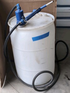 Brenntag 55 gallon drum w FMT manual pump.