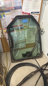 Bobcat skid steer door with windshield wiper