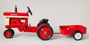 Vintage McCormick Farmall 560 Pedal Tractor and Matching Trailer