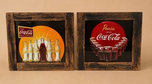 Two Framed Coca-Cola Advertising