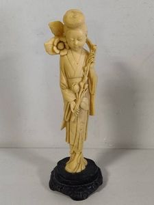 Carved Asian Statue
