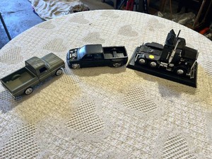 Jada Toys and Other Diecast Truck Models Including 1999 Silverado, 1969 Ford and Kenworth Truck