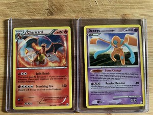 Lot of 2 Pokemon Trading Cards Featuring Charizard HOLO and Deoxys