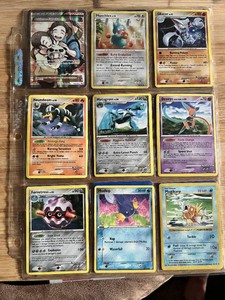 Lot of 18  Pokemon Trading Cards Featuring Characters Like Dragonite, Vileplume, Houndoom, and others