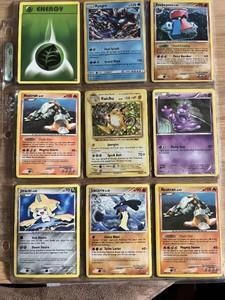 Lot of 18  PokEmon Trading Cards including Kyogre, Raichu, and Deoxys