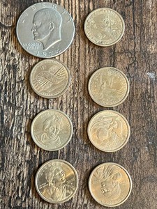 Eisenhower Dollar 1974 and Various Dollar Coins Including Sacagawea and Presidential Coins