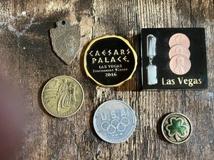 Commemorative Coin and Medal Collection featuring Caesars Palace Medal, USA Olympic Sponsor Coin, and Collectible Tokens